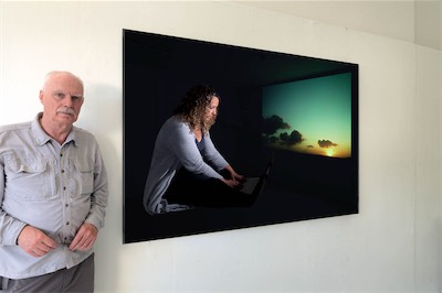 Geoff in front of a Backlight Display